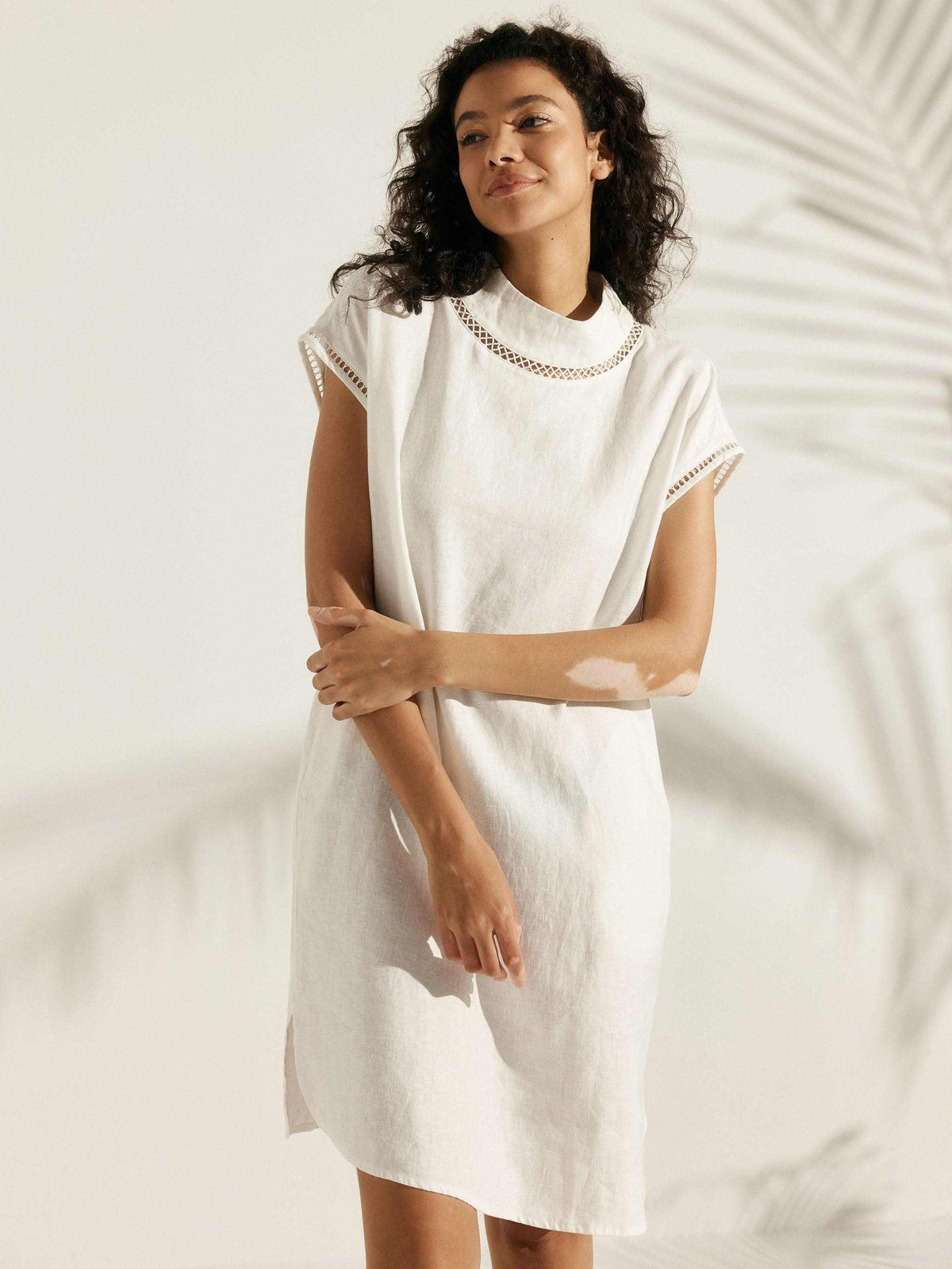 100% Linen Cutout Turtleneck Mini Dress with hollow lace trim and relaxed fit for modern effortless elegance