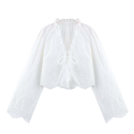 Elegant spring women's blouse with floral embroidery and V-neck cutout design