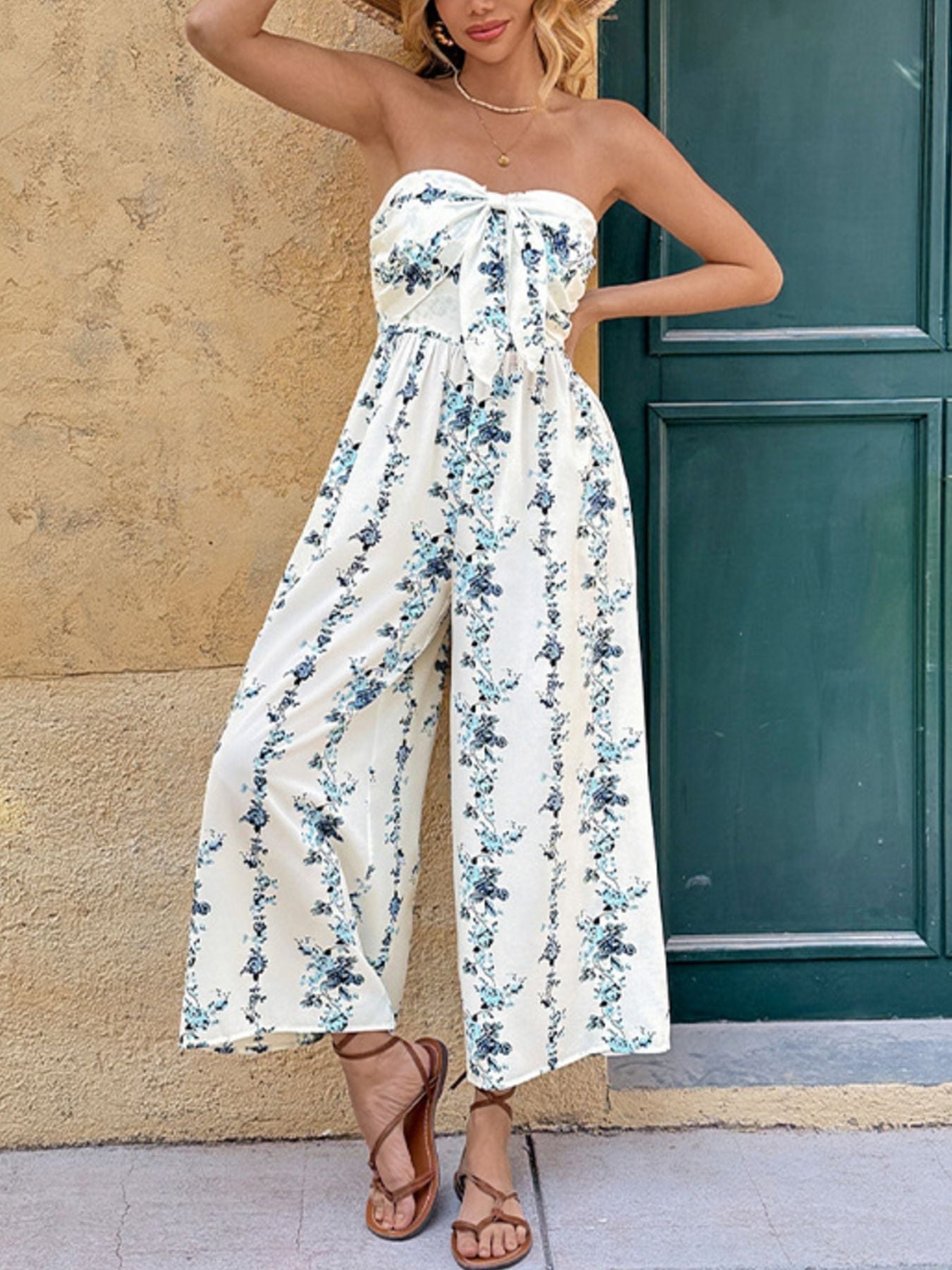 Women's tie front strapless wide leg smocked jumpsuit in polyester blend