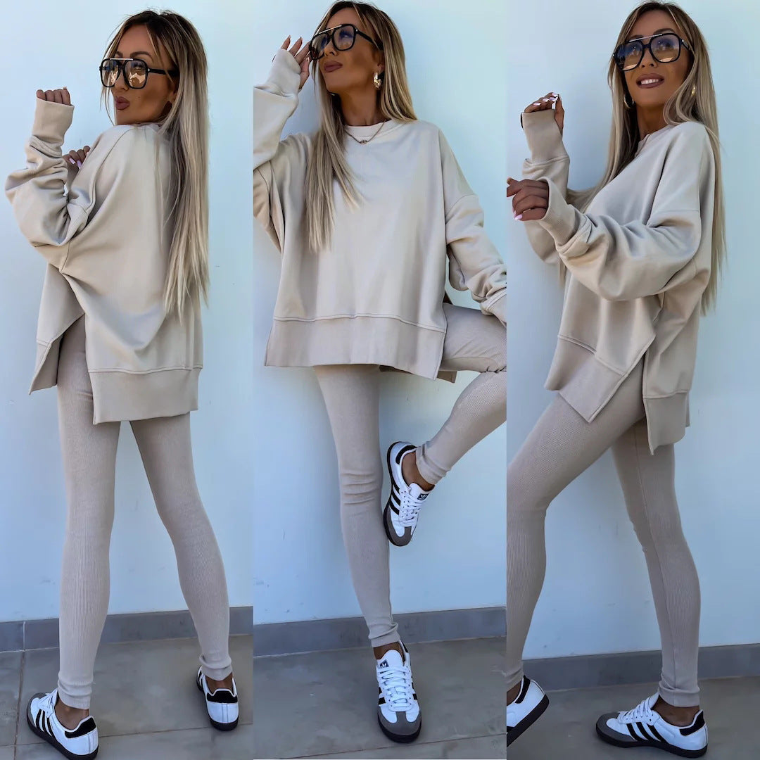 Women’s casual sweater suit with loose split top and fitted trousers set in soft fabric for cozy comfort and stylish look
