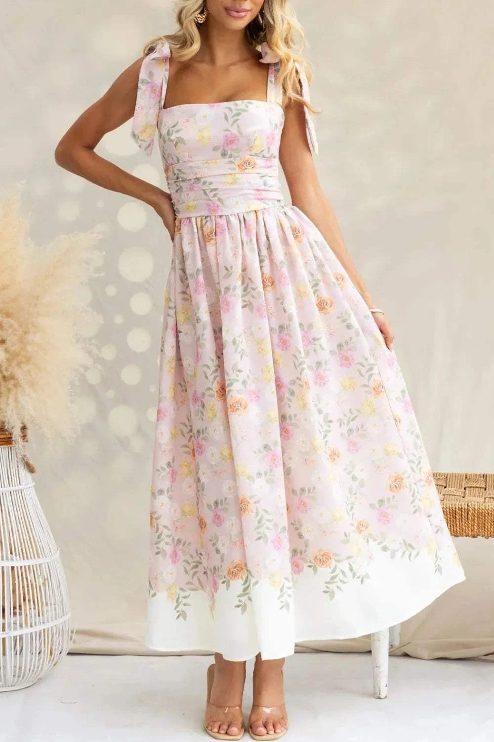 Printed tie shoulder midi cami dress with ruched details and no stretch, 100% polyester.