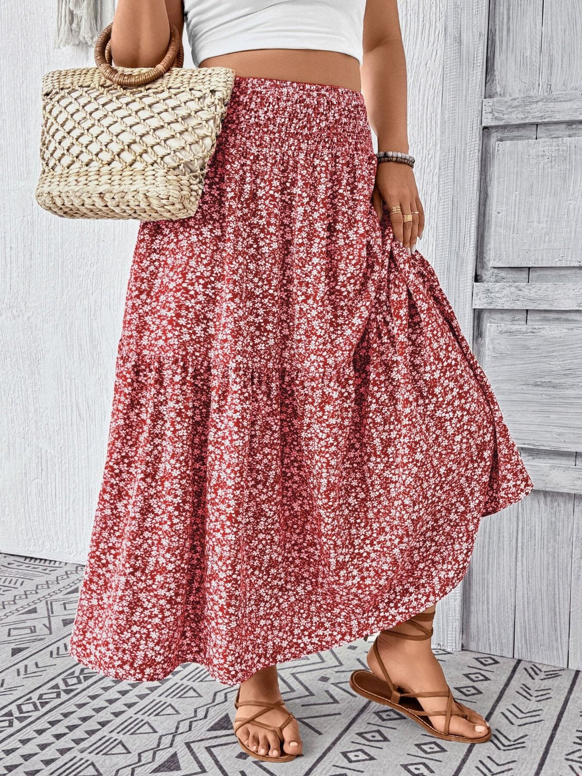 Plus size floral print tiered skirt with polyester spandex blend and basic style.