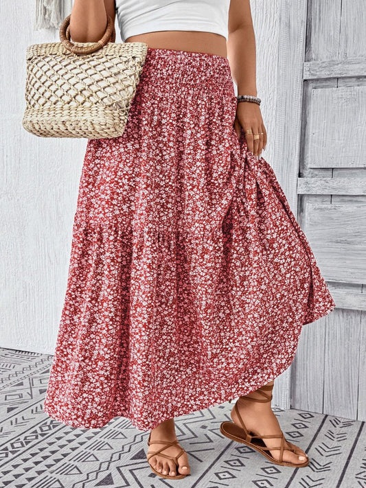 Plus size floral print tiered skirt with polyester spandex blend and basic style.