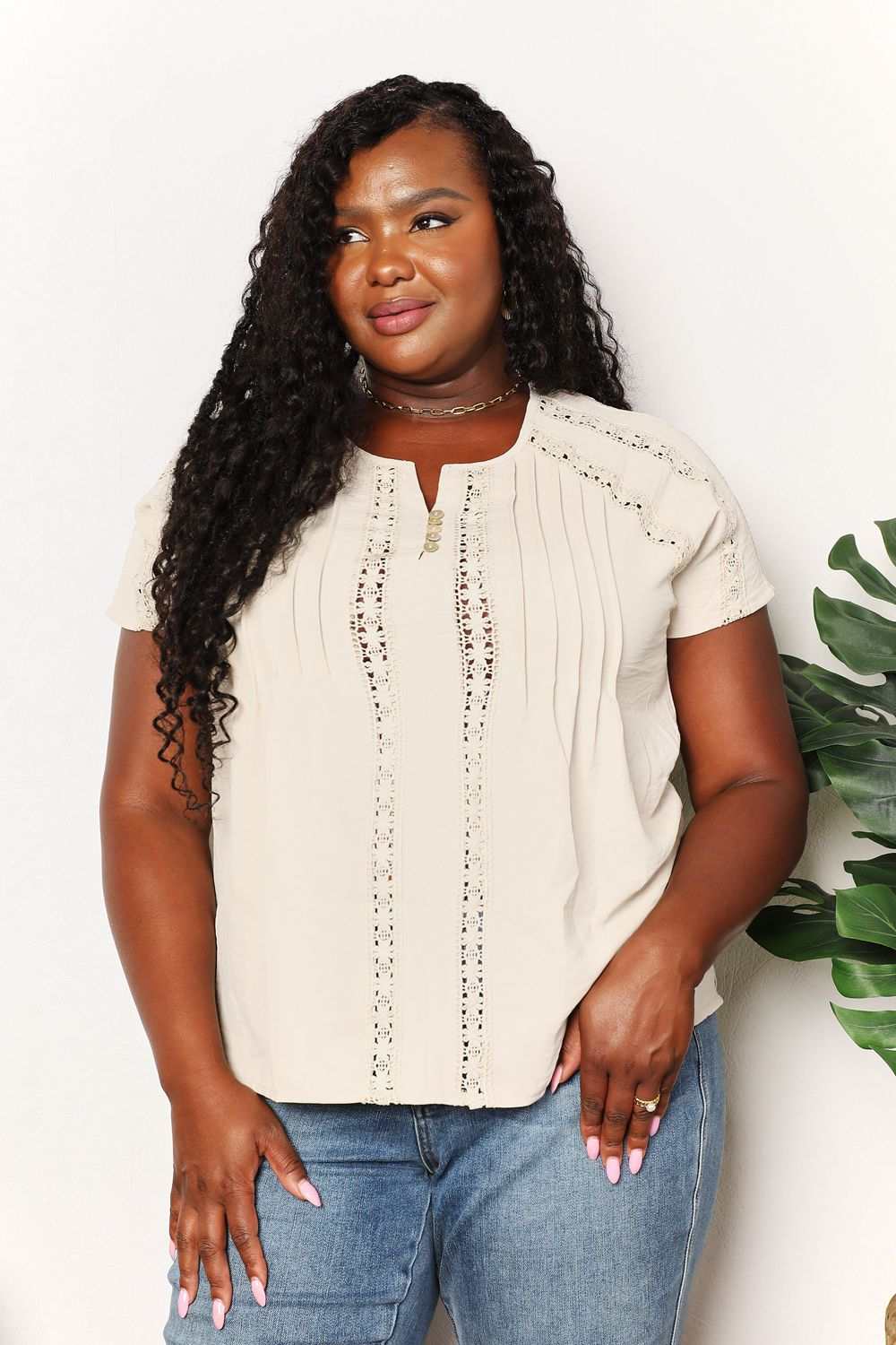 Double Take Crochet buttoned short sleeves top with round neck and solid chic design