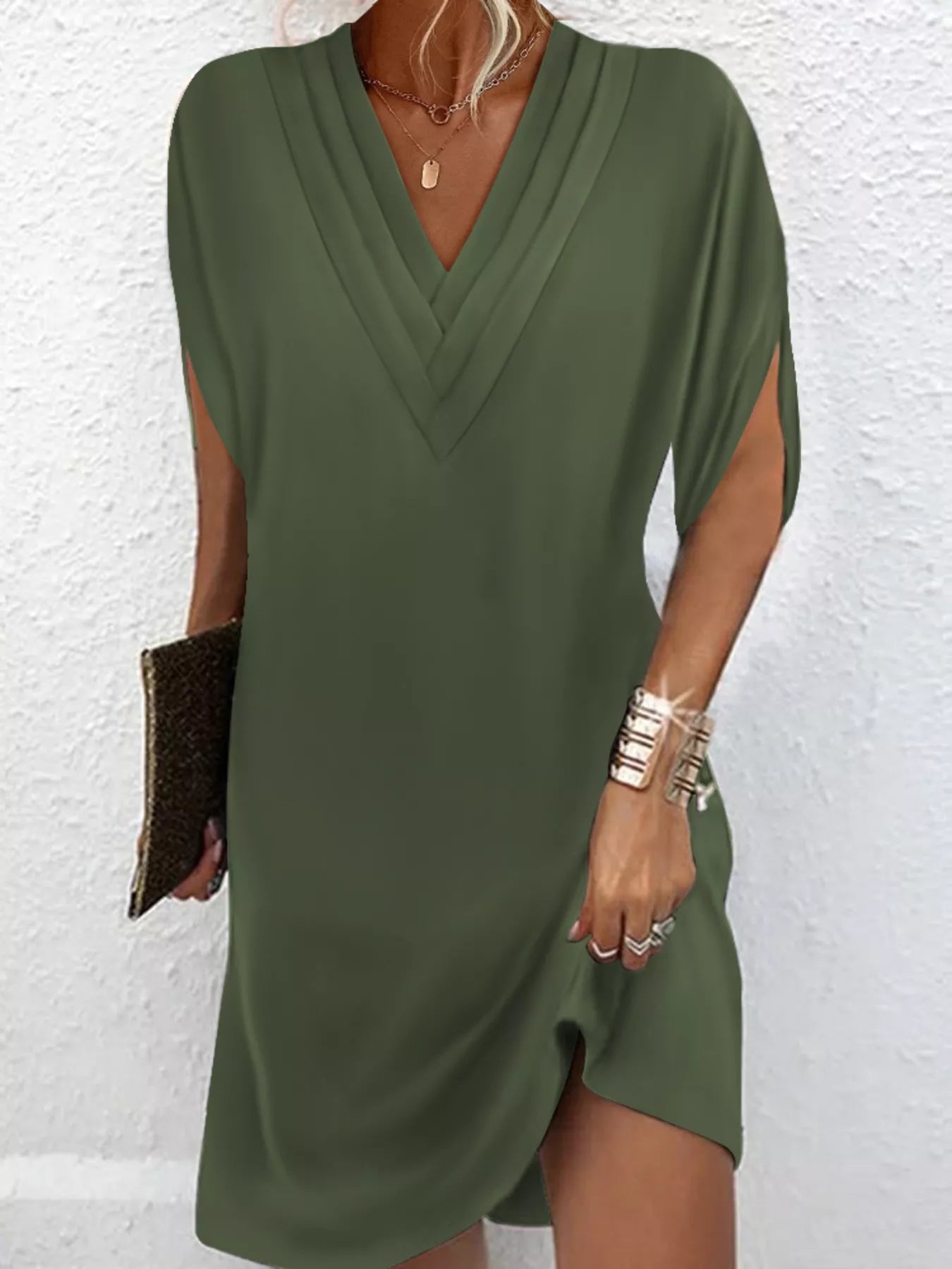 Plus size full size V-neck slit sleeve mini dress in polyester, machine washable, no stretch.