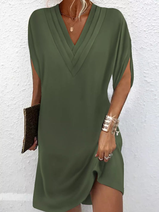 Plus size full size V-neck slit sleeve mini dress in polyester, machine washable, no stretch.
